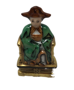 Regal Resplendence: Oriental Man on Green Throne Limoges Box