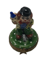 Whimsical Wonders: Limoges Box with Clown and Golden Friend