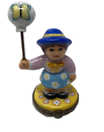 Whimsical Wonders: Limoges Box of a Girl with Butterfly Balloon