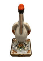 Graceful Avian Elegance: Hand-Painted Limoges Pelican Box with Striking Red Head