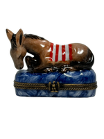 Freedom's Rest: Laid-Back Donkey with American Flag Saddle Limoges Box