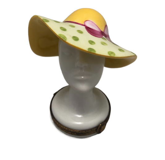 Elegance Personified: Hand-Painted Limoges Box - White Silhouette Hat Stand with Yellow Hat and Green Polka Dot Brim