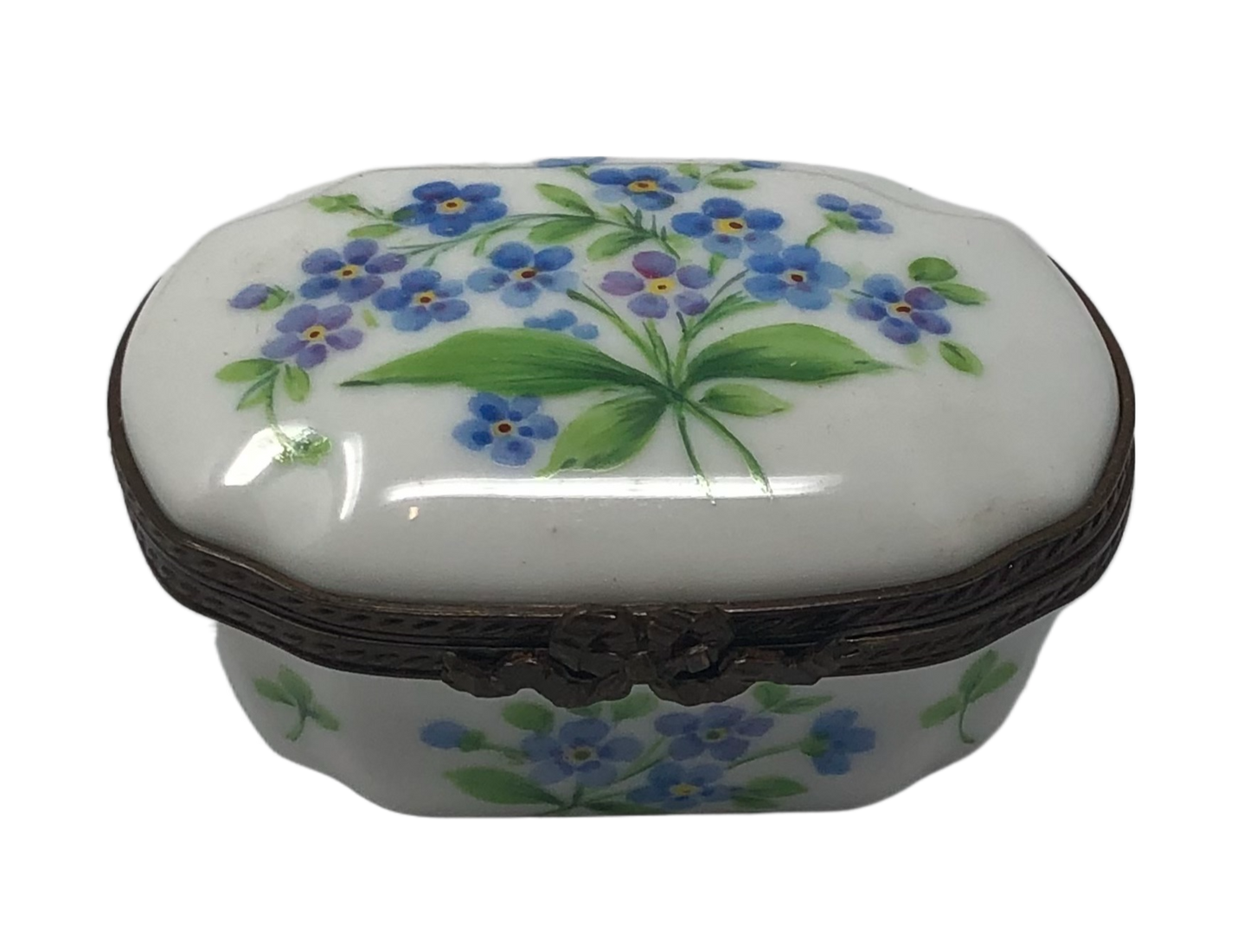 Whimsical Blooms: White Oval Limoges Box with Blue Flower Bouquet