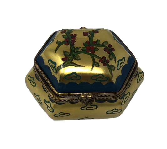 Gilded Holly: Hexagonal Golden Limoges Box with Blue Accents